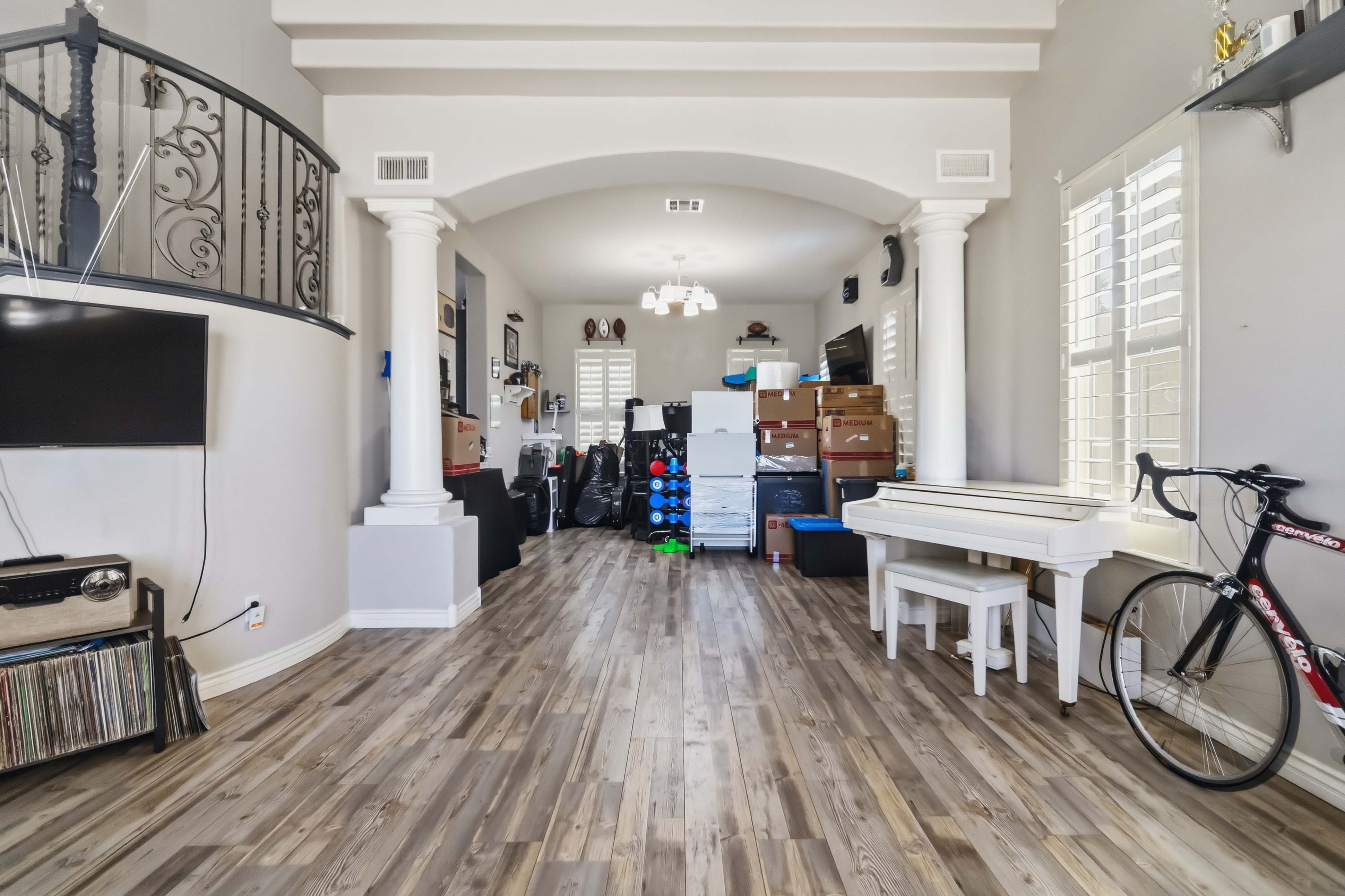 Expanded living area off the foyer at 9564 Trattoria Street with open floor plan