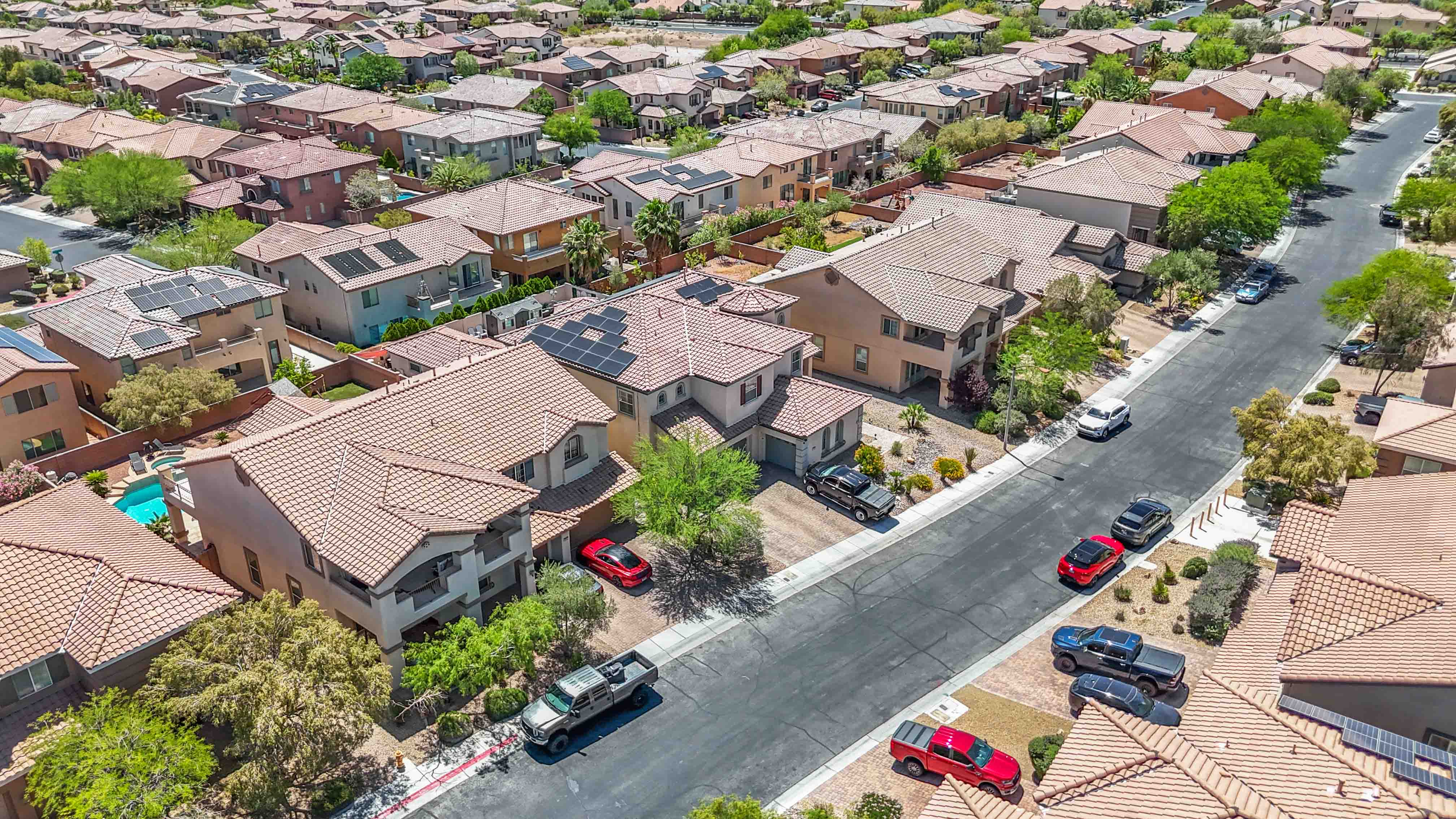 Bird's-eye view above 9564 Trattoria Street and the surrounding neighborhood streets