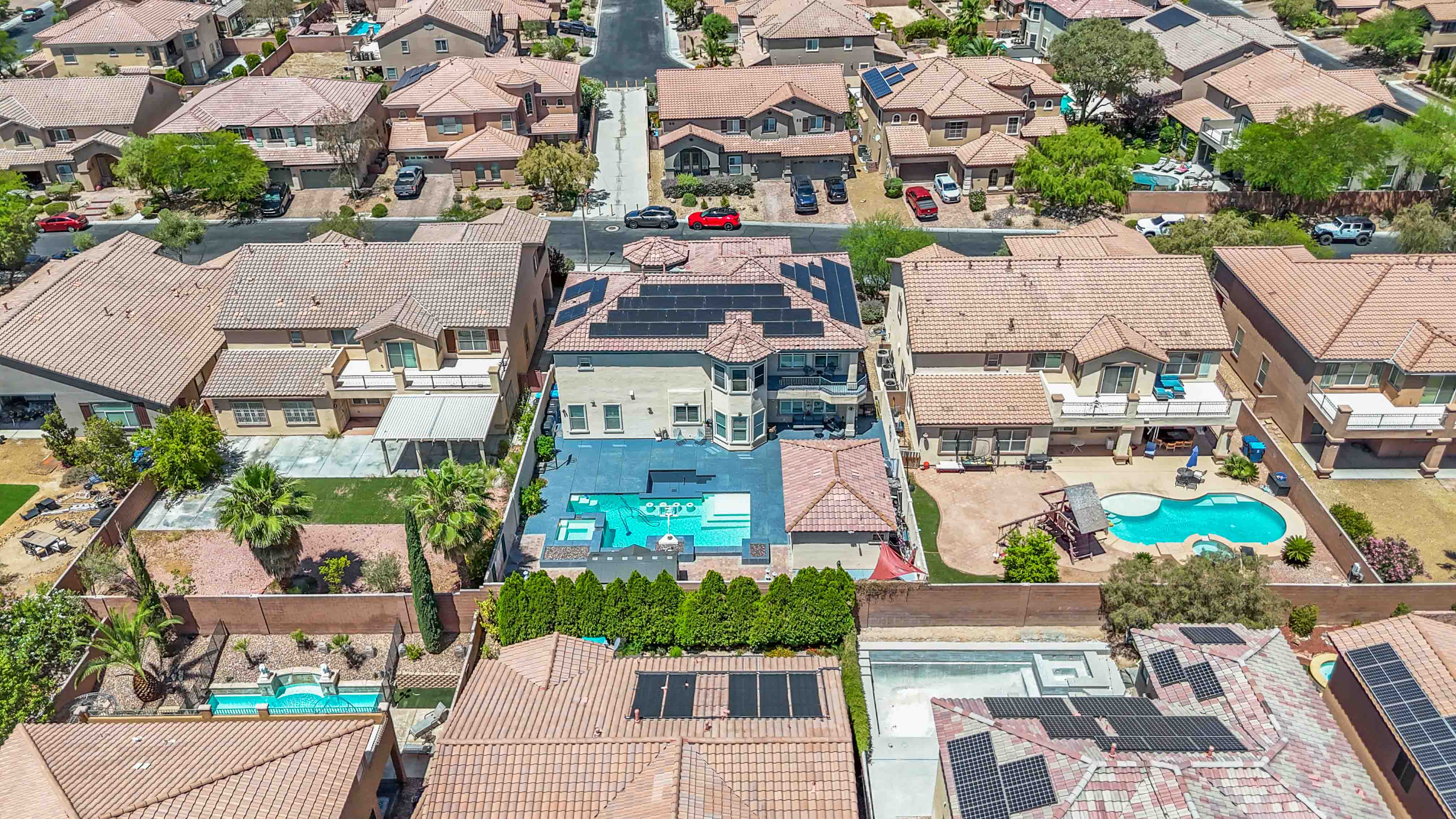 Direct overhead rear aerial of 9564 Trattoria Street highlighting the backyard amenities