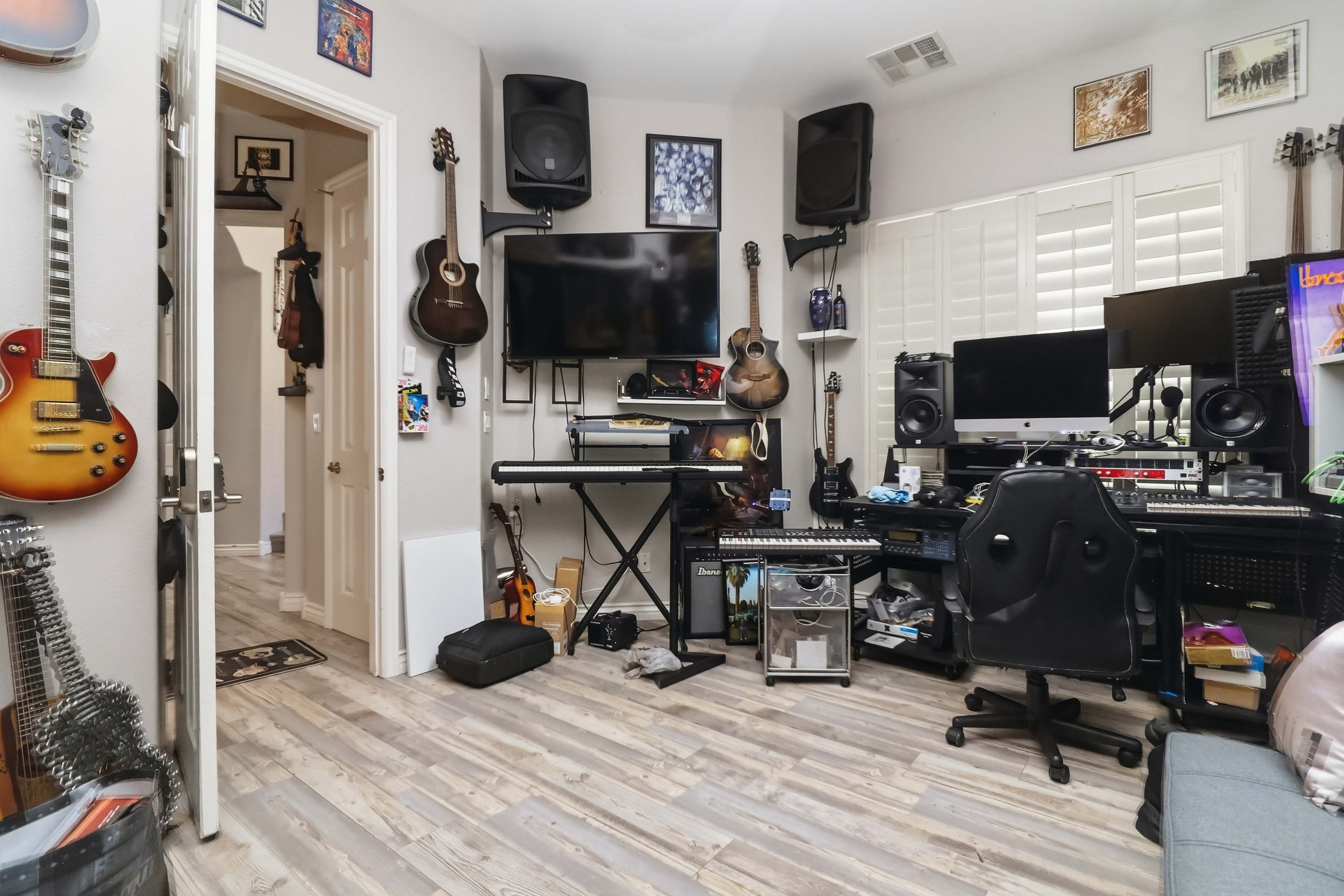 Secondary room at 9564 Trattoria Street configured as a music studio and office