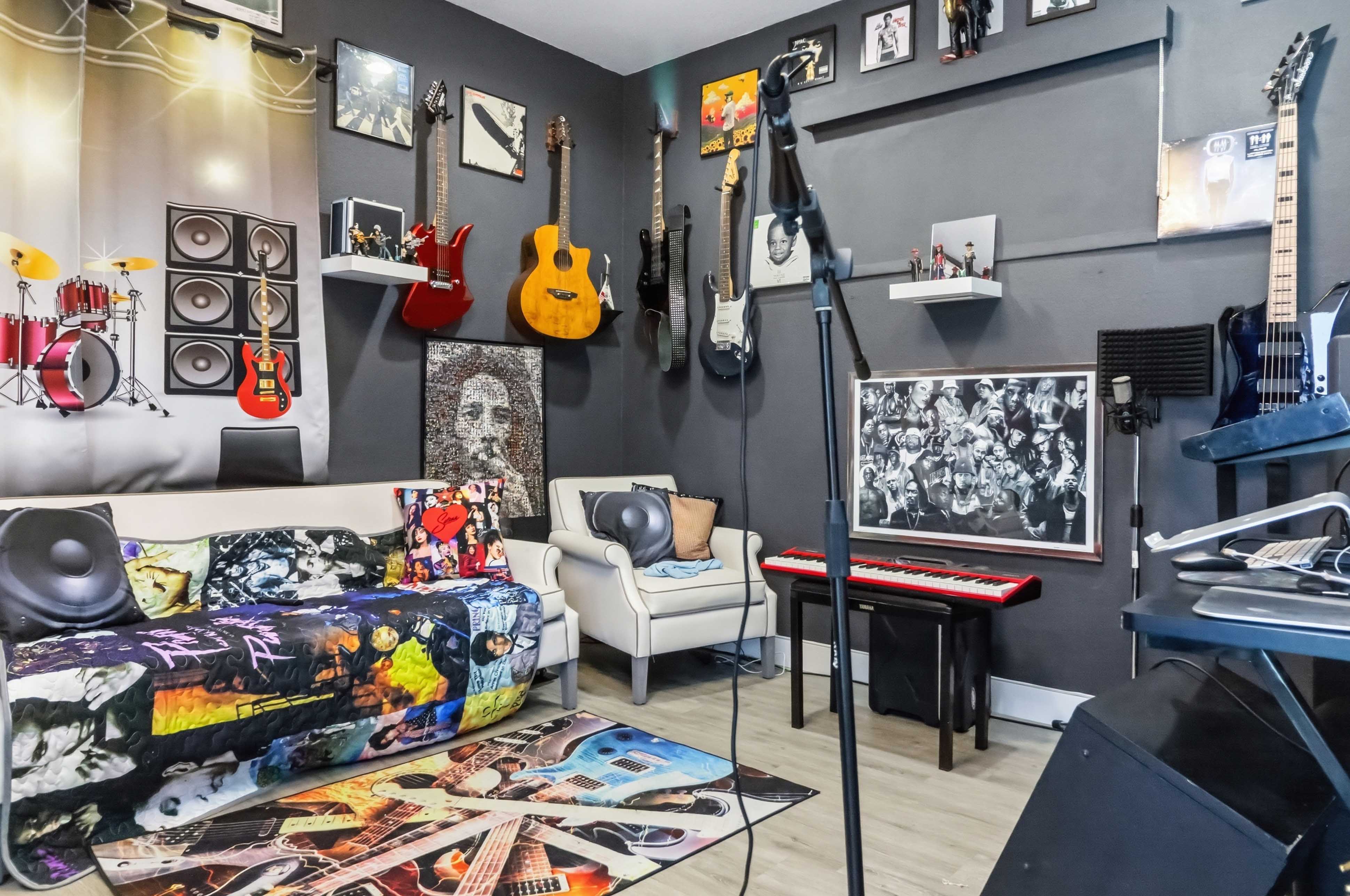 Creative studio room at 9564 Trattoria Street with acoustic treatment and recording setup