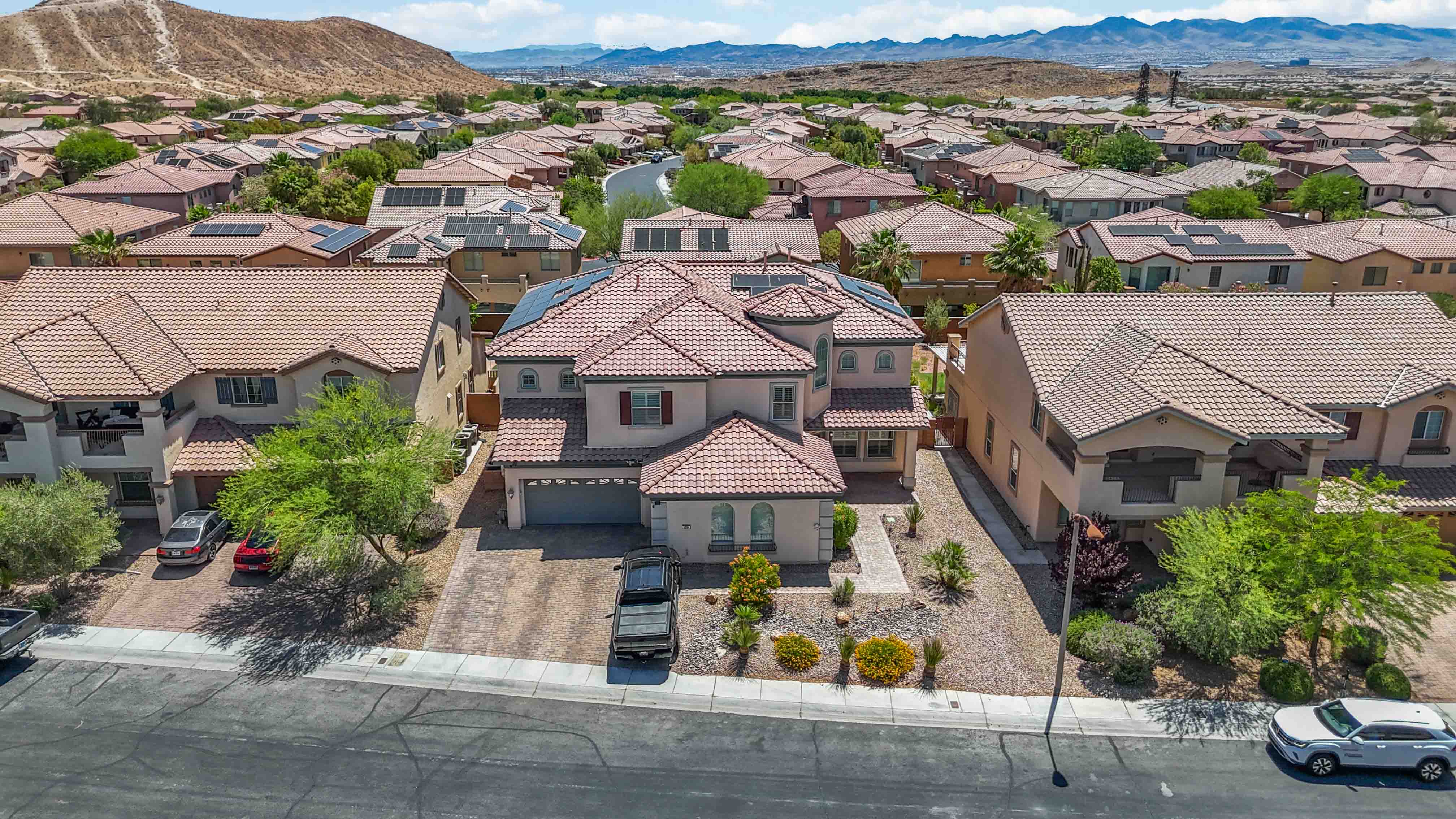 Wide aerial panorama near 9564 Trattoria Street with valley and mountain views