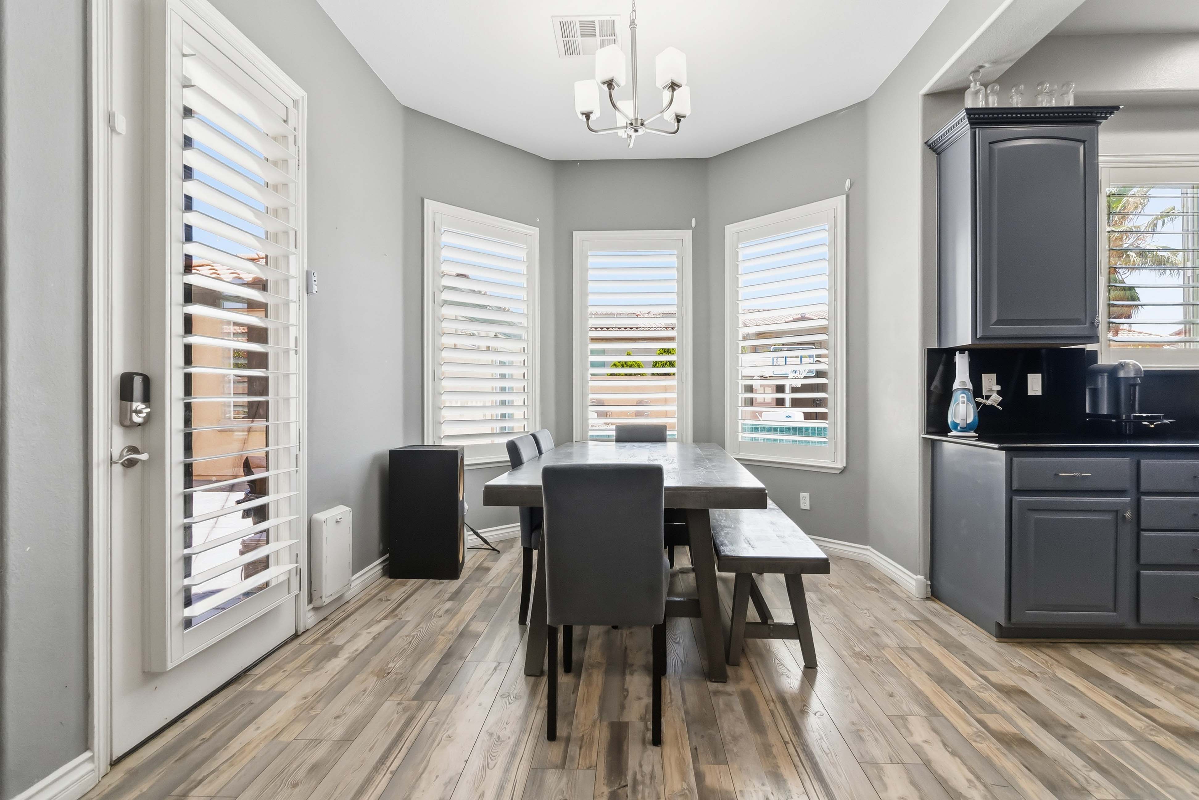 Dining nook at 9564 Trattoria Street overlooking the backyard