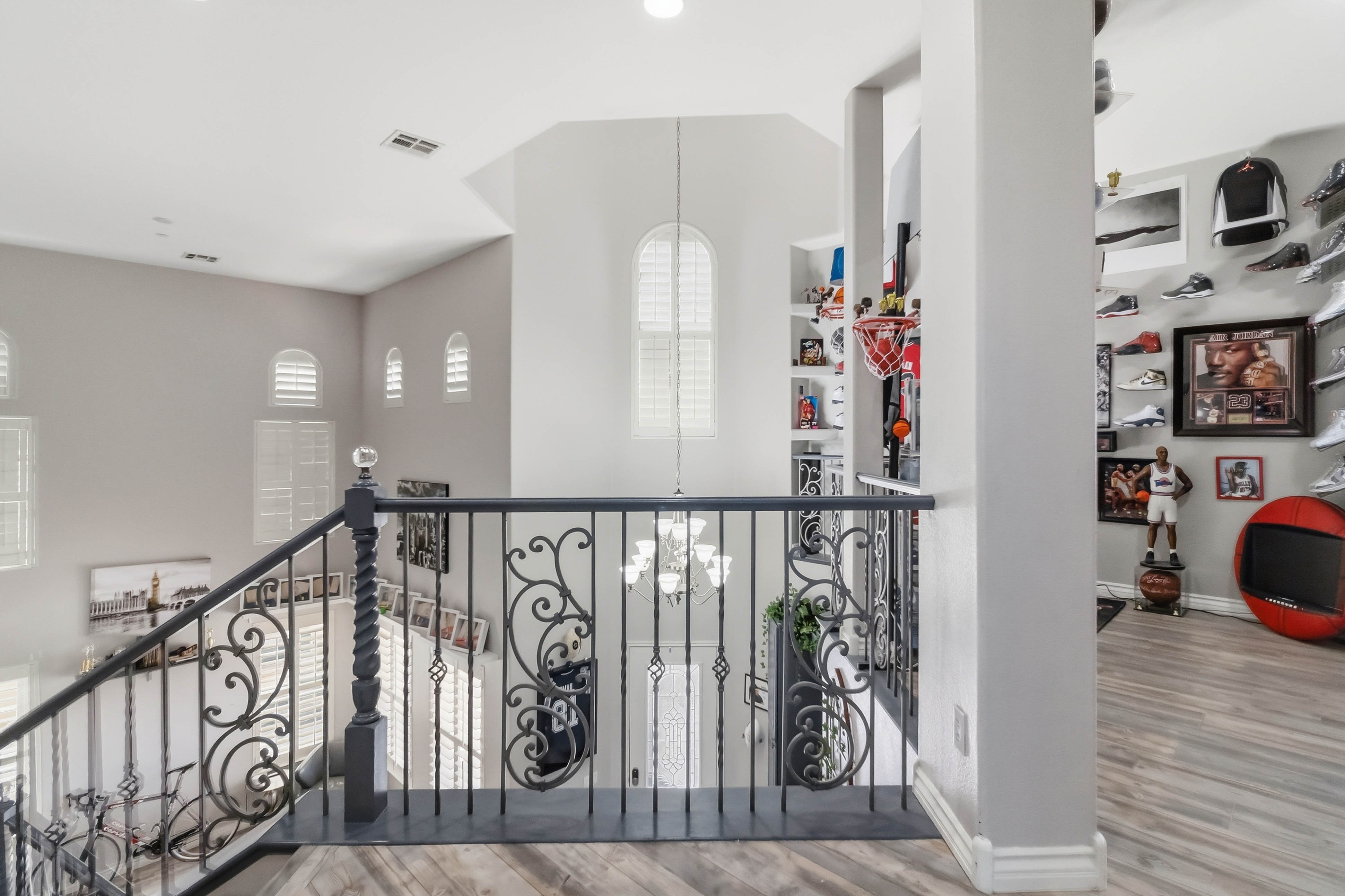 Upper-level overlook at 9564 Trattoria Street with views down to the foyer